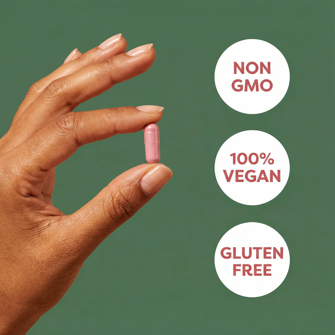 Hand holding a pink supplement tablet with 'Non GMO', '100% Vegan', and 'Gluten Free' labels on a green background.
